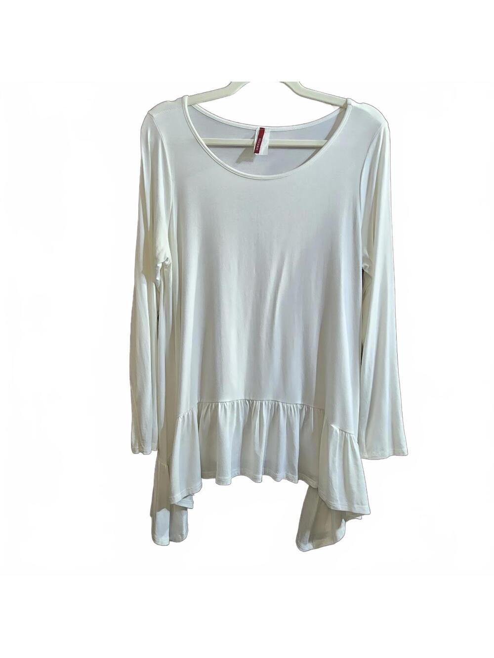 Bellamie White Long Sleeve Peplum Hem Top